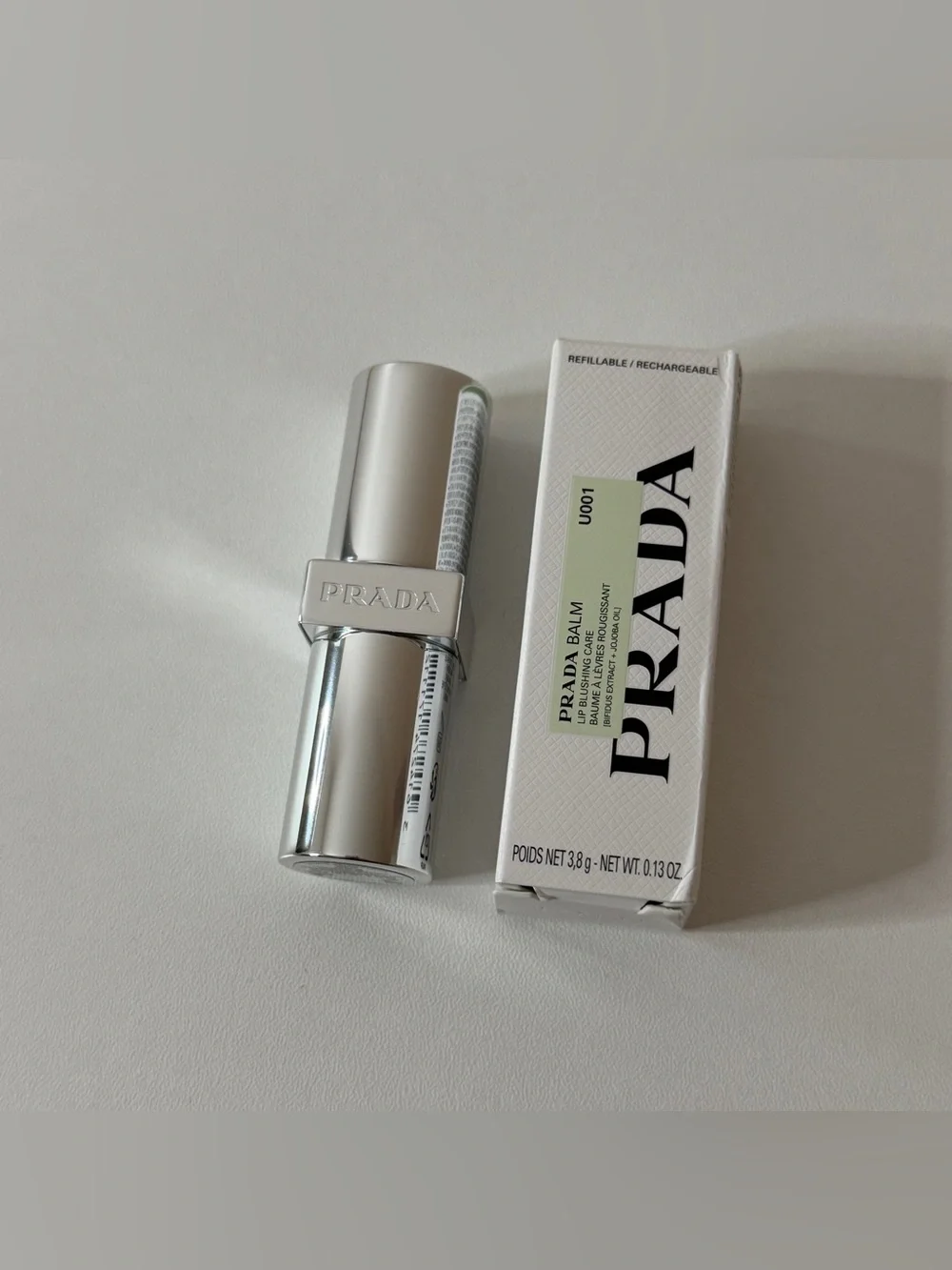 Prada Hydrating Lip Balm with Jojoba Oil (shade U001 astral pink)